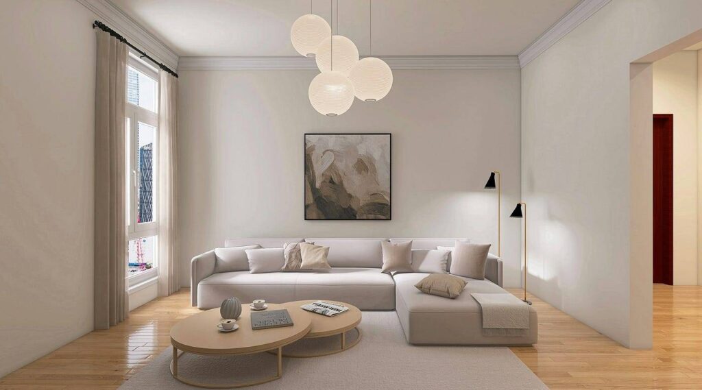 Minimalist living room with beige sofa, wooden floors, large windows, and a modern spherical lamp hanging from the ceiling.