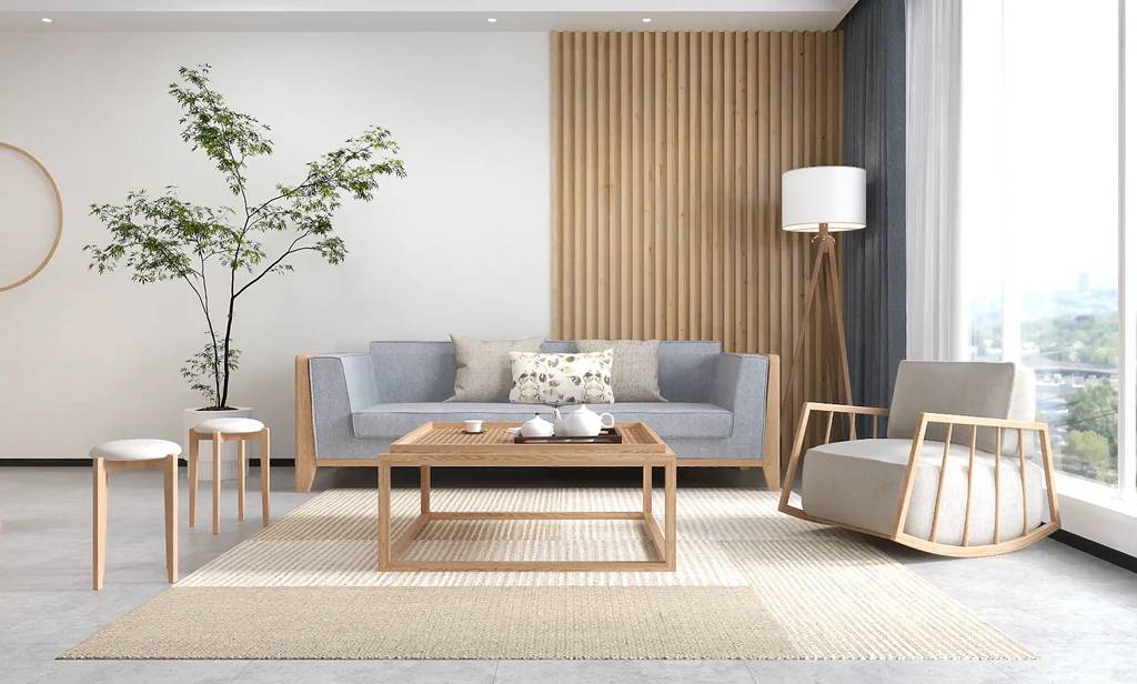  A living room featuring a light gray sofa, wooden furniture, a floor lamp, and a potted plant, with large windows letting in natural light.